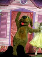 Wags performing on stage. (For a show related to Dorothy the Dinosaur.)