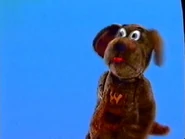 Puppet Wags kicking his legs