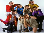 The Wiggles, Captain Feathersword and the Irwin family in white background [Note: The Wiggles in their 1997-2001 outfits]