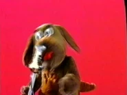 Puppet Wags chasing the microphone