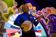 Anthony playing the banjo in the Party Time Big Show