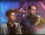 Lindsay performing with The Cockroaches in 1994.