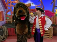 Captain Feathersword teaching Wags how to fetch the ball