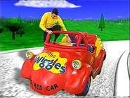 Greg getting in the Big Red Car