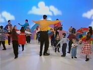 The Wiggles and the children turning around