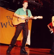 Anthony in the turquoise polo shirt