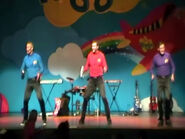 The Professional Wiggles playing percussion instruments