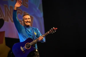 Anthony playing blue Maton Guitar