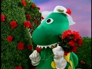 Dorothy picking roses while singing