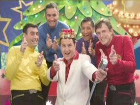 Wilson and the Wiggles in a promotional picture for Santa's Rockin'!.