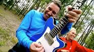 Anthony playing his blue Maton electric guitar in "The Wiggles Show!" TV Series