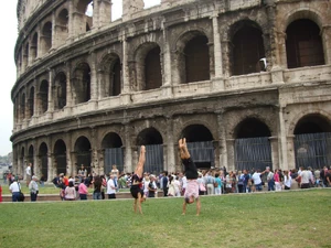Anthony and Lauren doing a handstand at the Colosseum