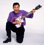 Jeff playing his purple Maton electric guitar