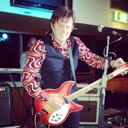 Murray playing Rickenbacker 360/12 electric guitar