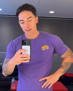 John in Danny's short sleeve shirt