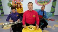 The Wiggles listen to the song