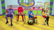 The Wiggles playing their instruments in a different order