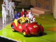 Santa Claus in The Big Red Car