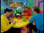 Dorothy serving soup to the Wiggles