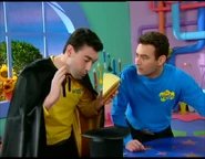 "Don't worry. I'm not going to feed it to him. I'm just trying to coax him out."