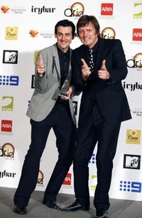  and  with the band's award at the 2009 ceramony.