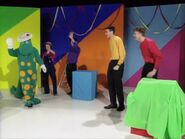 The Wiggles and Lucy greets her.