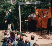 Anthony in white T-shirt, Greg in goldenrod skivvy