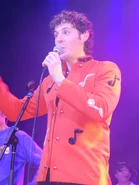 Lachlan Gillespie wearing the jacket during a 2016 reunion concert.
