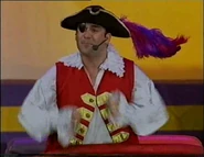 Captain Feathersword in the Big Red Car