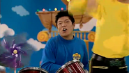 Samuel playing the drums