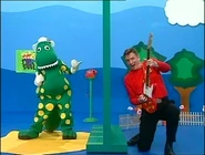 TootToot!318.jpeg (53 KB) Murray playing Red Starry Guitar and Dorothy playing air guitar