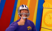 Jeff wearing a football helmet