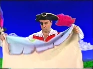 Captain Feathersword looking at the treasure map