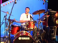 Greg playing the drums