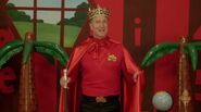 Simon dressed as a king, and he wonders if The Wiggles can guess who he's dressed as
