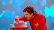 Murray feeding his goldfish Sparkle