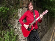 Murray playing Maton acoustic guitar in Ireland