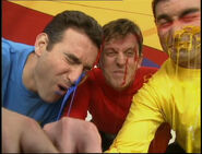 The Awake Wiggles with paint on their faces