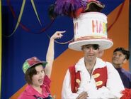 "Captain Feathersword, the cake is underneath your hat."