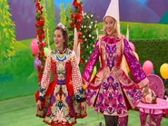 Fairy Clare and Fairy Larissa curtsying their Irish Dancing sparkly and glittery fairy dresses