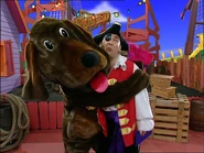 Wags hugging Captain Feathersword