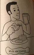 Anthony drinking milk and eating cookies in "Ready, Set, Wiggle!"