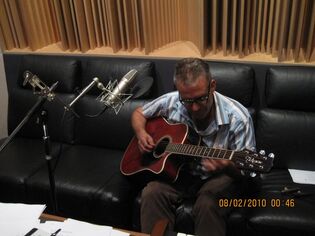 Field recording guitar during sessions for 