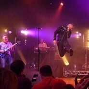 Anthony, Jeff, and Paul performing during the band's 2014 reunion.