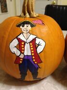 Captain Feathersword on a pumpkin