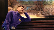 Jeff sleeping at a snake exhibit