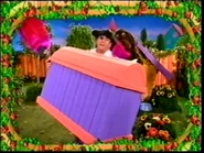 Captain Feathersword holding an empty treasure chest