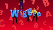 The Wiggles holding the letters in the word "wiggle"