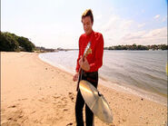 Murray playing his red Maton electric guitar in "Splish Splash Big Red Boat"