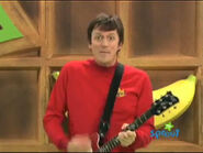 Murray playing his red Maton electric guitar on "Wiggly Waffle"